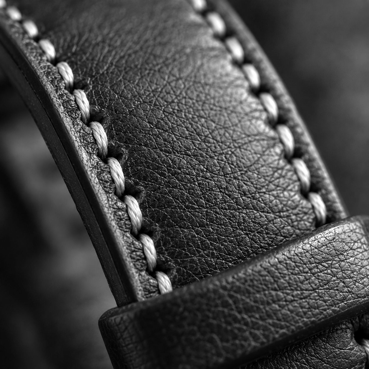 Hand-stitched leather strap